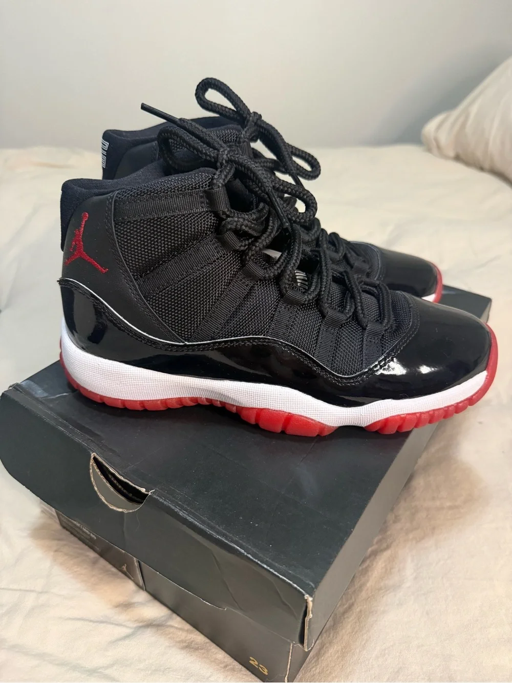 Jordan womans Black and Red High-Top Sneakers